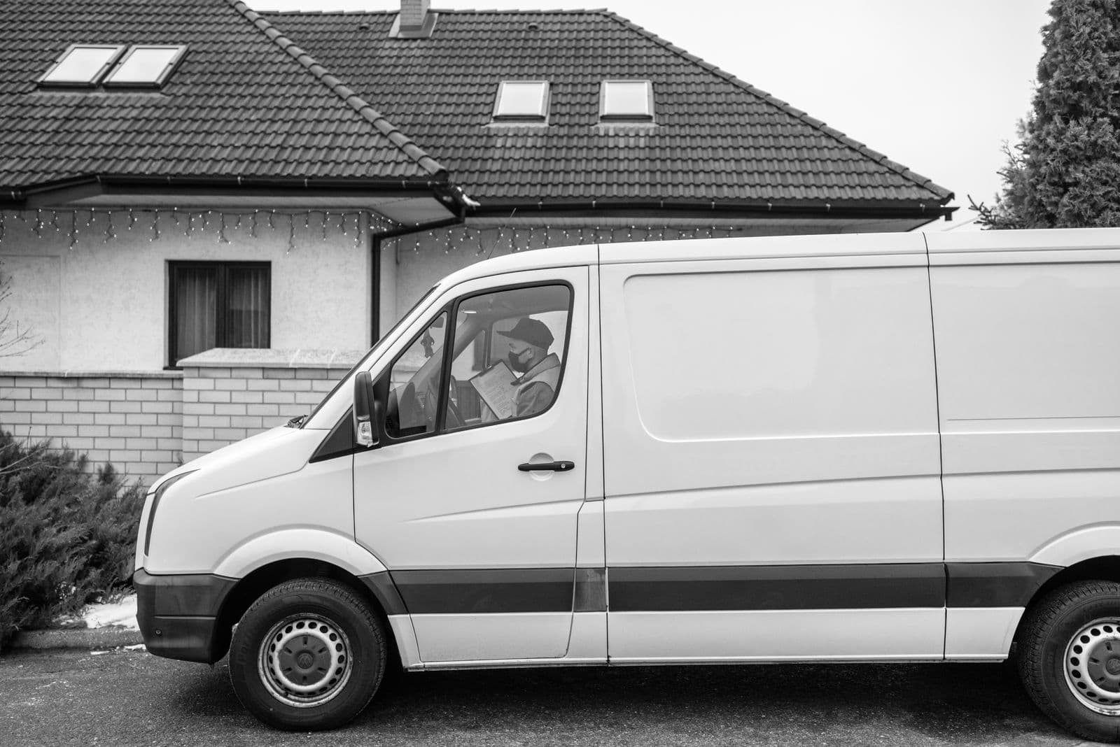 Right Choice Logistics delivery van with driver on a residential street